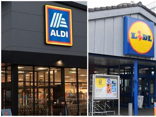 Side-by-side storefront signs of Aldi and Lidl supermarkets